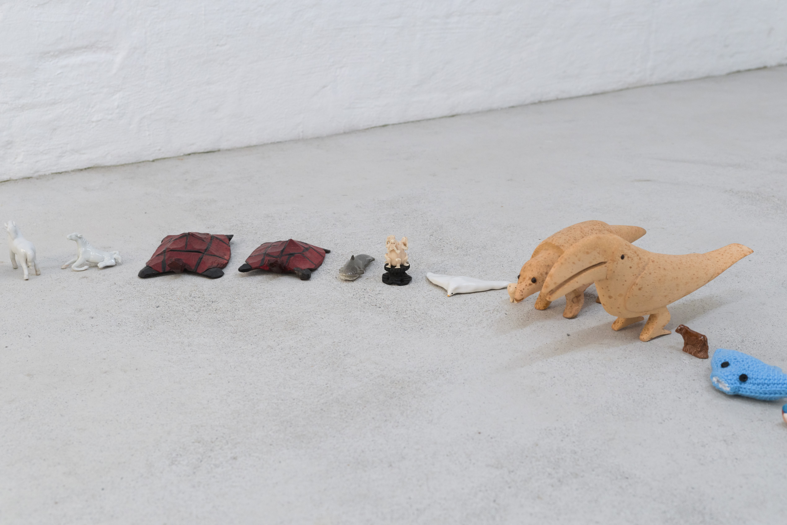 Emily Jones, The Lookers, Porcelain, glass, wicker, plastic, rubber, cotton & wooden animal figures, lollipop (detail) Emily Jones, The Lookers, Porcelain, glass, wicker, plastic, rubber, cotton & wooden animal figures, lollipop (detail)