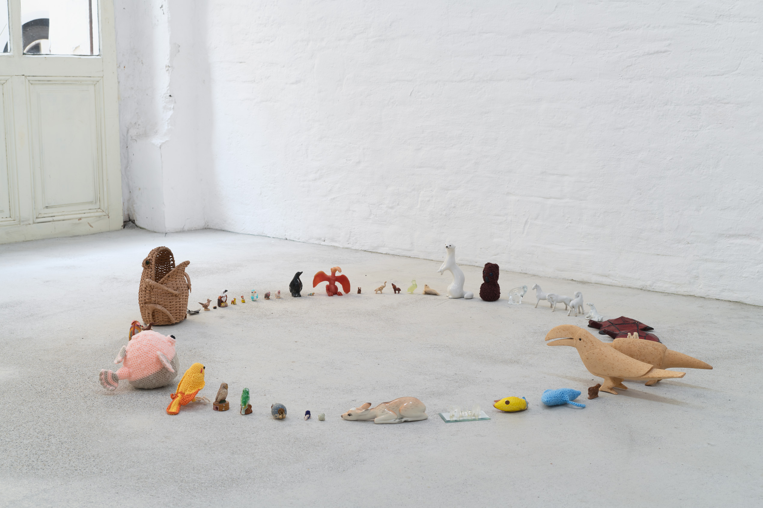 Emily Jones, The Lookers, Porcelain, glass, wicker, plastic, rubber, cotton & wooden animal figures, lollipop Emily Jones, The Lookers, Porcelain, glass, wicker, plastic, rubber, cotton & wooden animal figures, lollipop